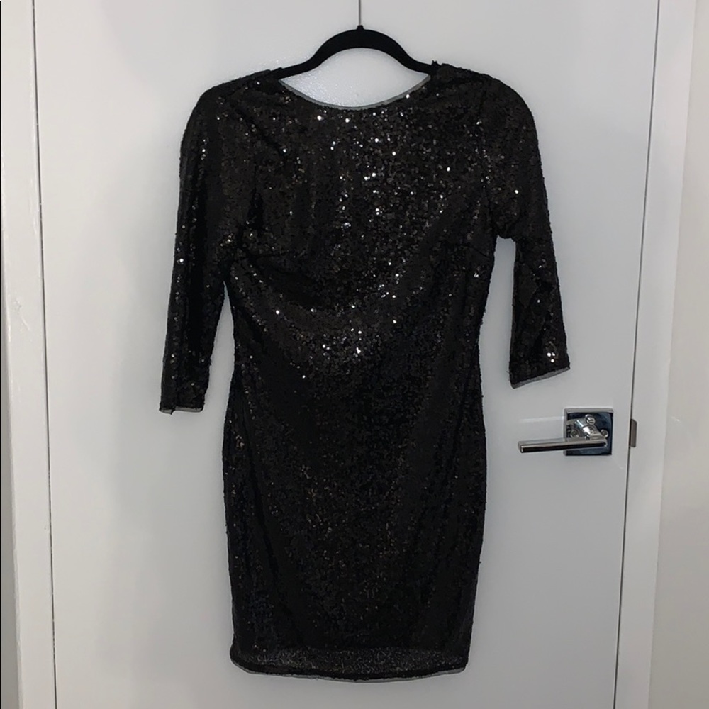 Sparkly, backless body con mini skirt